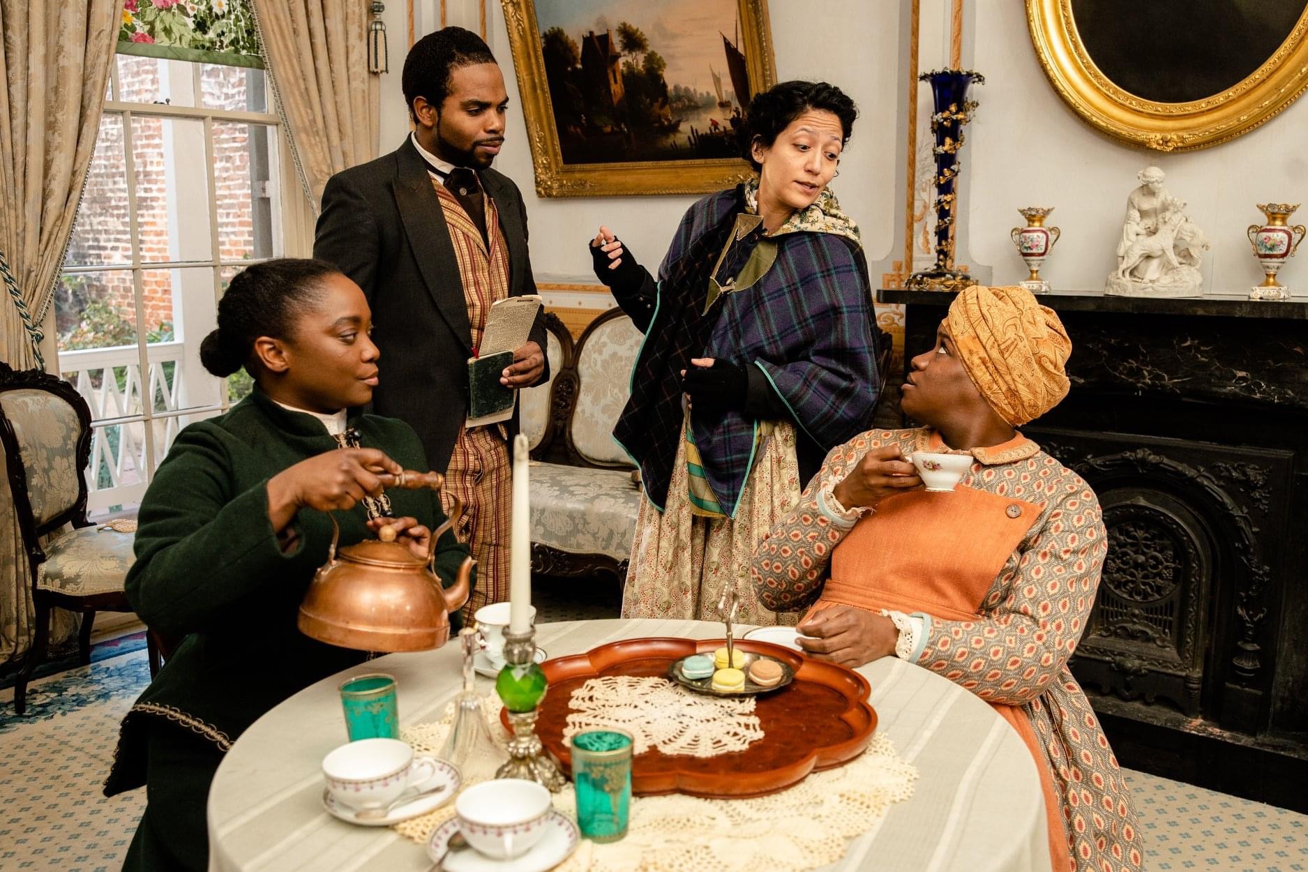 Tenaj Wallace directing tea party scene